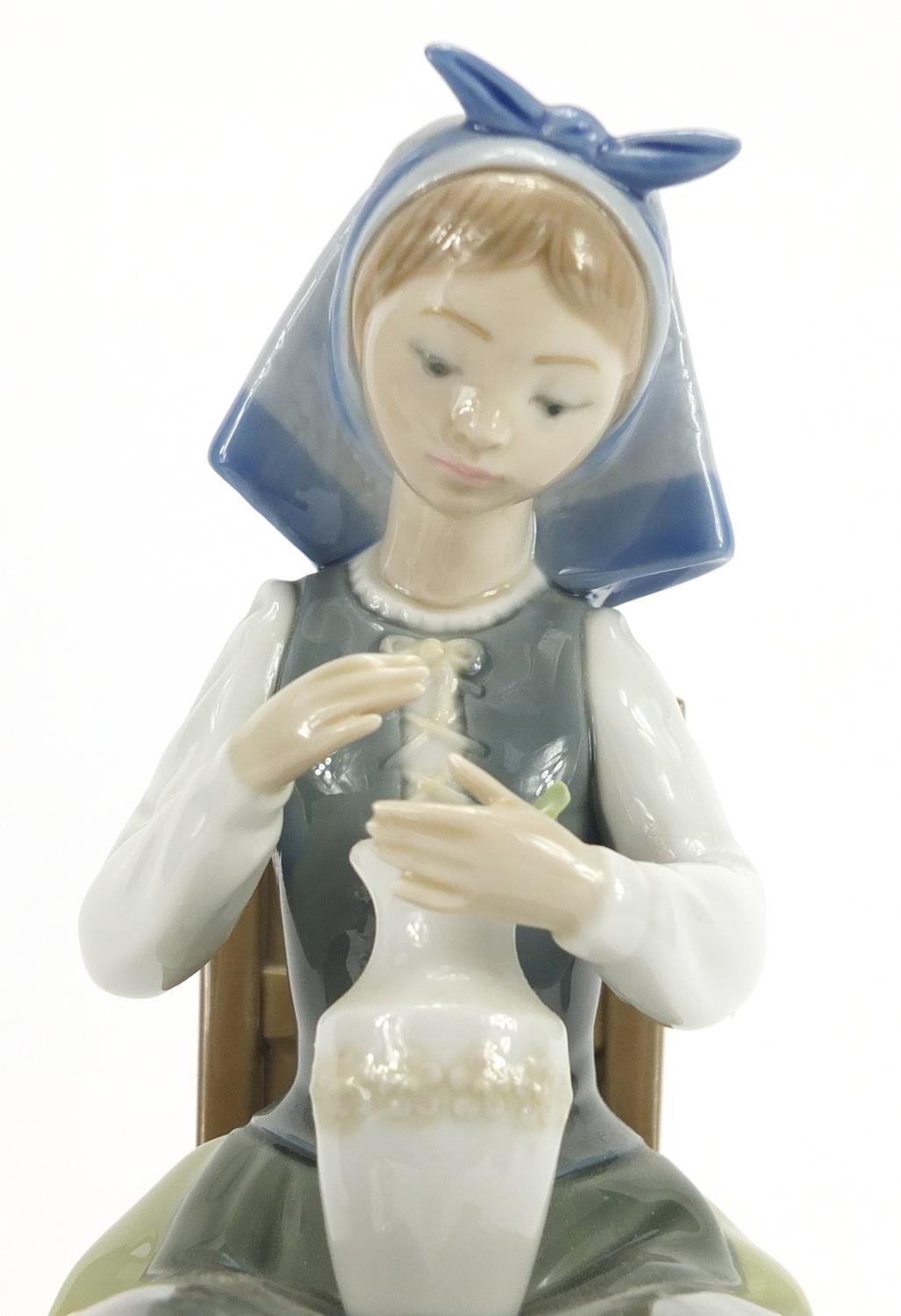 Lladro figurine of a seated girl with a vase, 21cm high : For Further Condition Reports Please visit - Image 2 of 5