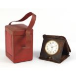 Victorian red leather carriage clock case and a vintage eight day travel clock : For Further