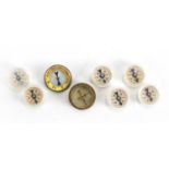 Eight miniature compasses, the largest 2cm in diameter : For Further Condition Reports Please