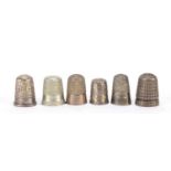 Six silver and white metal thimbles : For Further Condition Reports Please visit our website - We