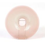 Circular pink and white ribbed glass bowl of fluted form, 34cm in diameter : For Further Condition