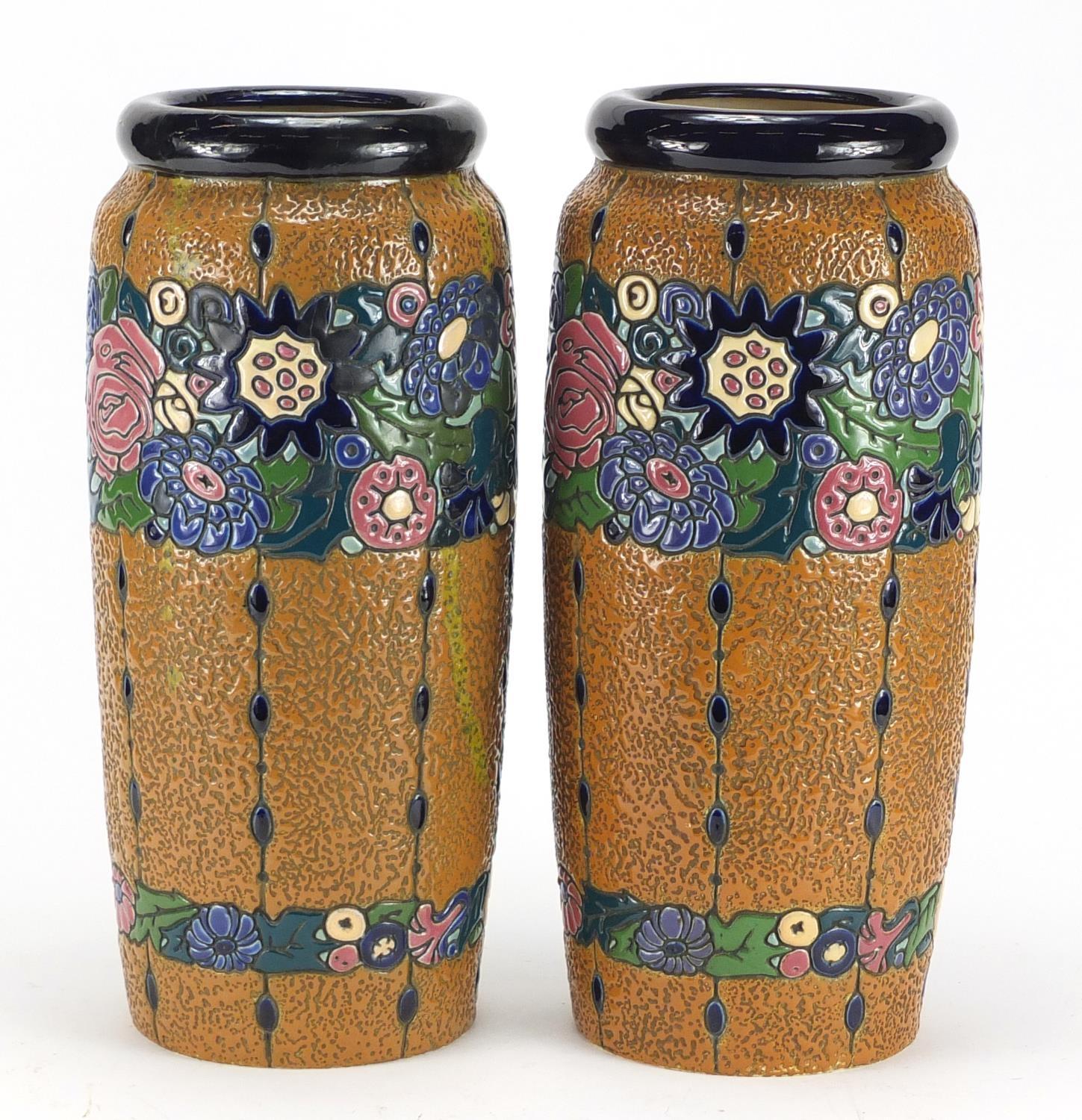 Large pair of Art Nouveau Czechoslovakian pottery vases by Amphora, enamelled with flowers, each