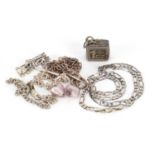 Silver and white metal jewellery including a one ounce ingot, necklaces and bracelets, 78.0g : For
