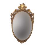 Oval gilt framed wall hanging mirror, 83cm x 51cm : For Further Condition Reports Please visit our