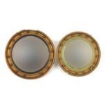 Two circular gilt framed convex mirrors including Atsonia, the largest 46cm in diameter : For