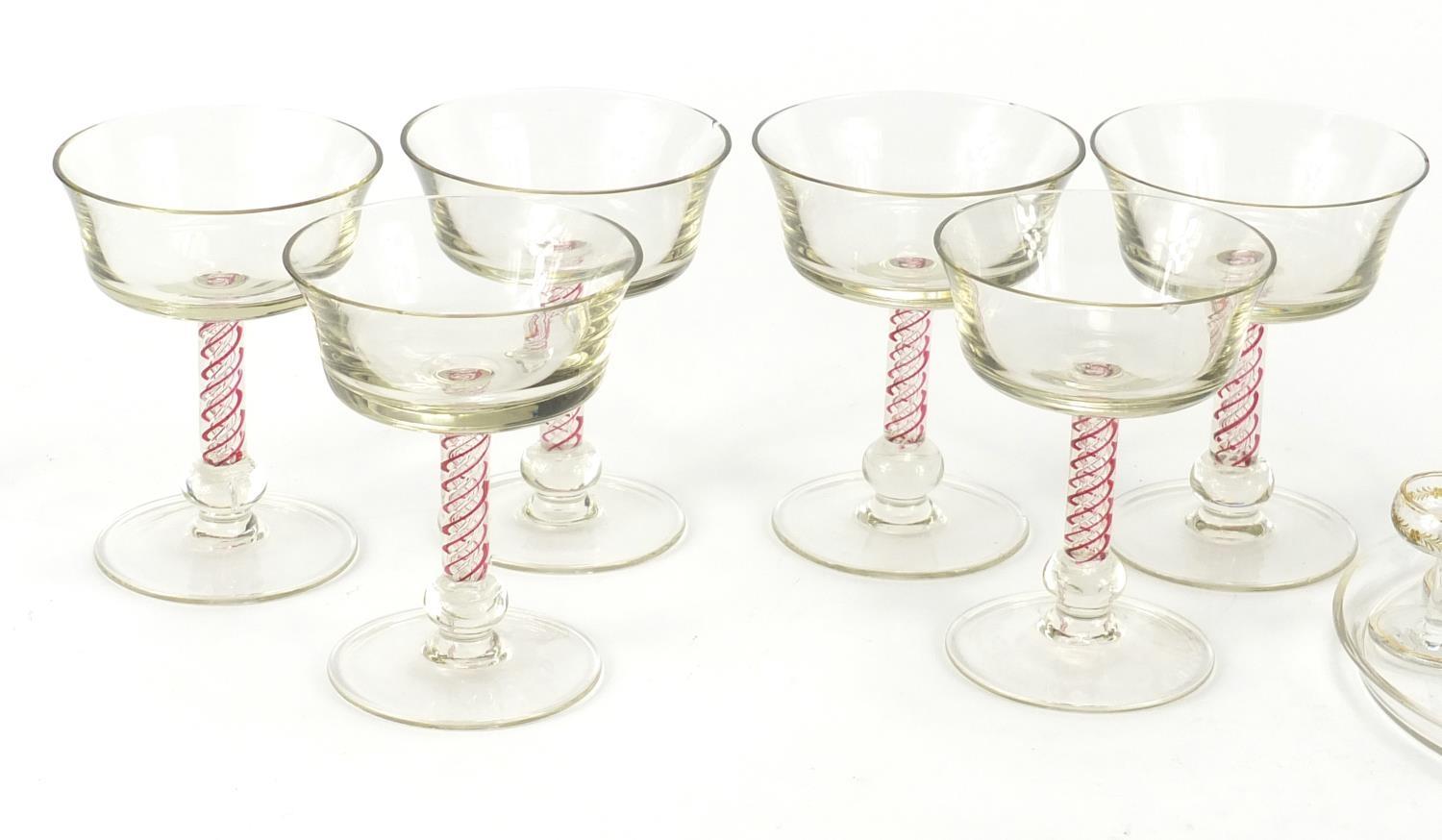 Glassware including a cabaret service, gilded with flowers and six glasses with air twist stems, the - Image 2 of 3