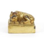 Chinese gilt bronze seal in the form of a sleeping lion, 8cm in length : For Further Condition