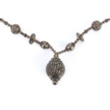 Middle Eastern silver necklace with ball of rope design pendant, 48cm in length, 109.0g : For