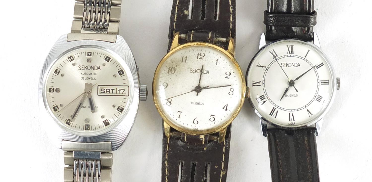 Three vintage Sekonda wristwatches : For Further Condition Reports Please visit our website - We