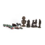 Bronzed figures and animals including a Beethoven bust, erotic couple and a young girl playing
