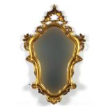 Gilt framed cartouche shaped wall hanging mirror, 76cm x 48cm : For Further Condition Reports Please