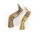 Two Victorian brass pipe tamper's in the form of two legs with boots, the largest 5.5cm high : For
