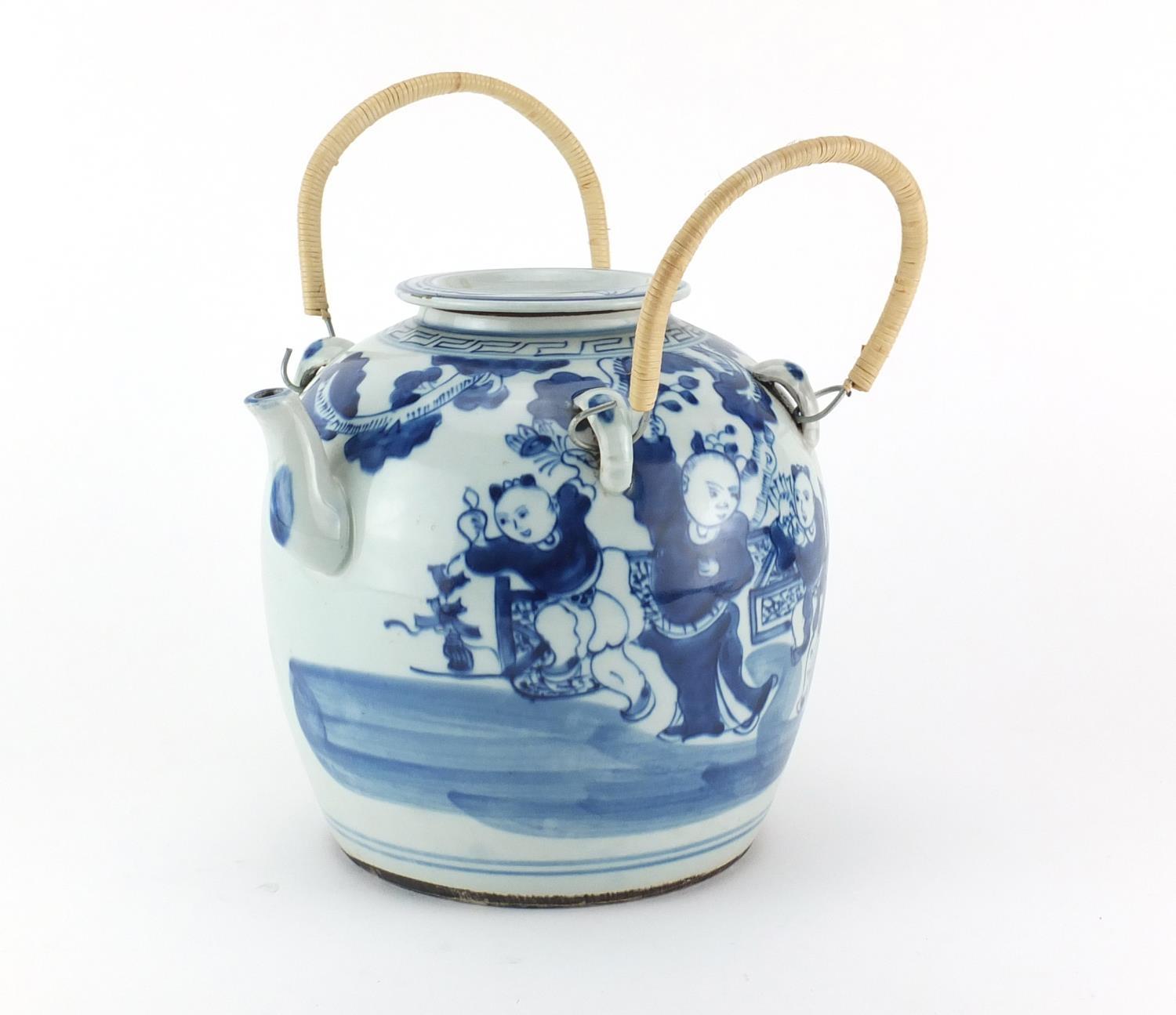 Large Chinese blue and white porcelain teapot with wicker handles, 22cm high excluding the handles :