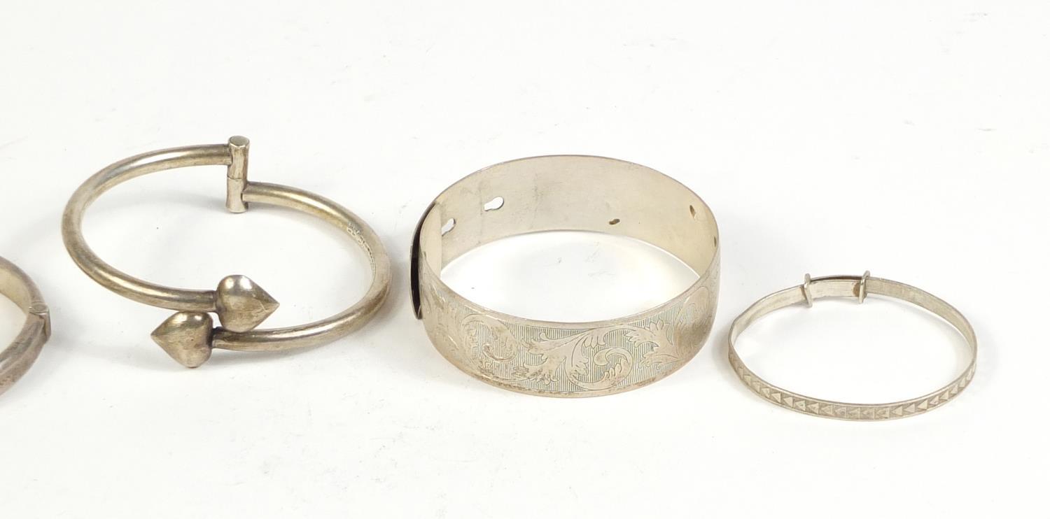 Five silver and white metal bangles, 65.5g : For Further Condition Reports Please visit our - Image 3 of 6