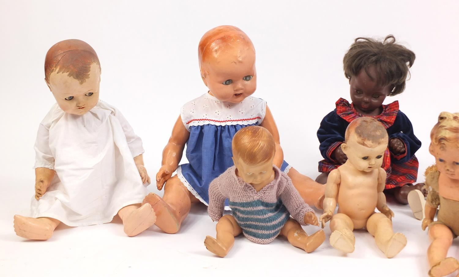 Eight vintage composite dolls, some with articulated limbs and open/close eyes, the largest 62cm - Image 2 of 3