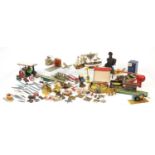 Vintage toys including tin plate vehicles, a Mamod steam tractor, hand painted figures and a