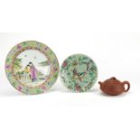 Chinese terracotta yixing teapot and two porcelain plates decorated with birds, insects and figures,