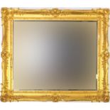 Rectangular ornate gilt framed wall hanging mirror, 68cm x 58cm : For Further Condition Reports