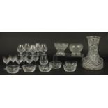 Cut crystal and glassware including a large vase, fruit bowl and two sets of six glasses, the