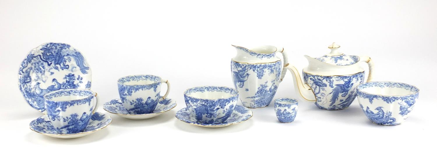 Royal Crown Derby blue and white porcelain tea service, decorated with birds of paradise, the teapot