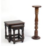 Mahogany torchere and a nest of two tables, the torchere 85cm high : For Further Condition Reports