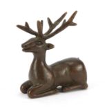 Japanese patinated bronze stag, impressed marks to the base, 6cm high : For Further Condition