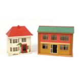 Two vintage wooden and plastic dolls houses, the largest 51cm in length : For Further Condition