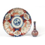 Japanese Imari charger and a bottle vase with silver mounts, the charger 30cm in diameter : For