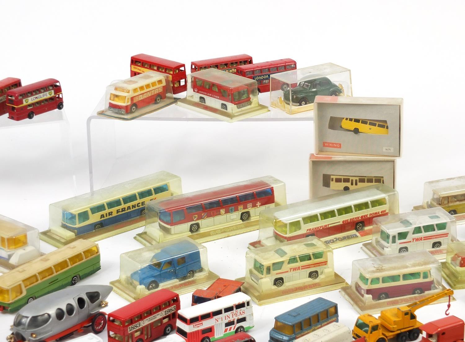 Mostly die cast vehicles including Majorette coaches, Matchbox Series and a D & M pulling and - Image 5 of 6