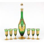 Bohemian gilded green glass decanter and six glasses, the decanter, 45cm high : For Further