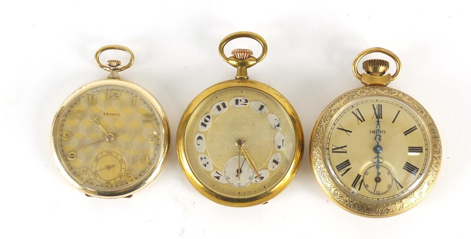Three gentleman's gold plated open face pocket watches including Smiths and Tempo, the largest 5cm