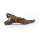 Carved wood study of an iguana on a branch, 50cm in length : For Further Condition Reports Please