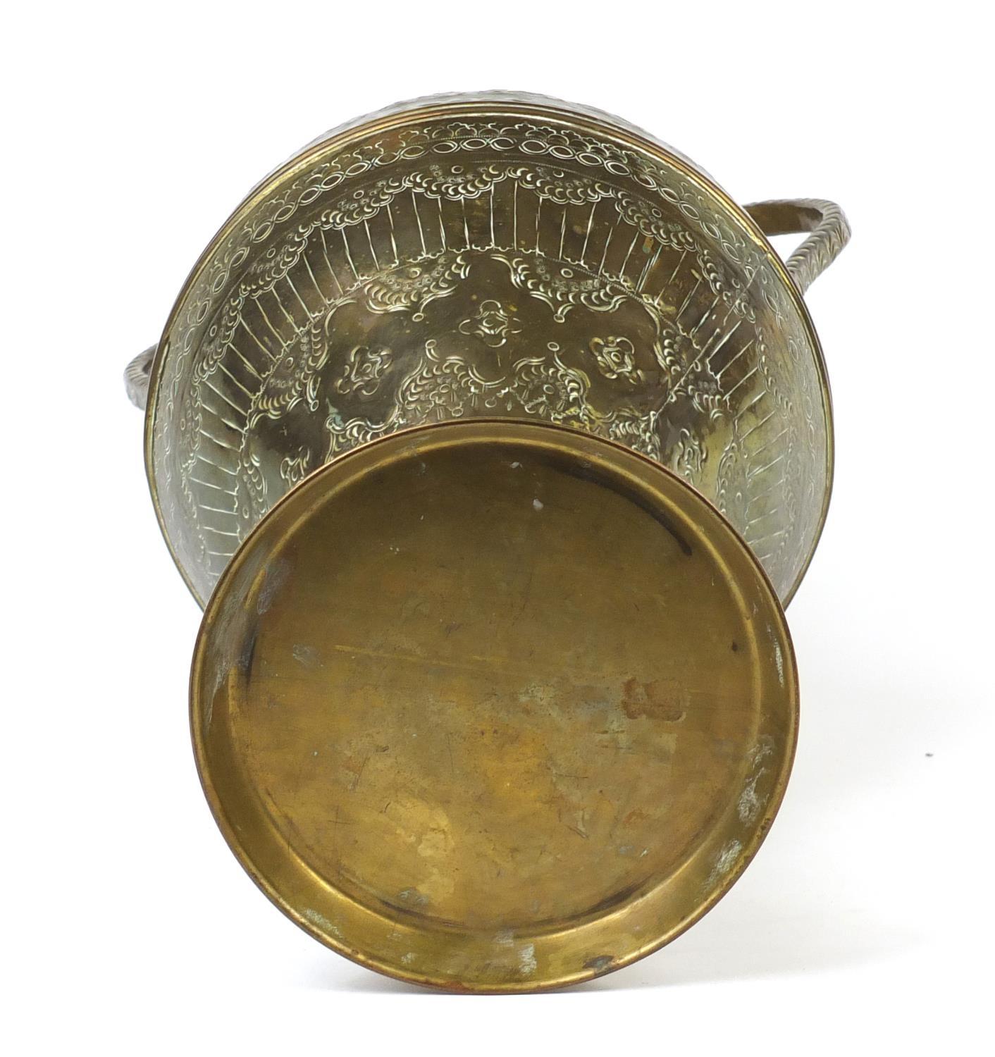 Large Indian brass twin handled vase and circular tray, both embossed and engraved with foliate - Image 5 of 5