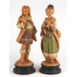 Two large terracotta figures of a Victorian male and female, 40cm high : For Further Condition