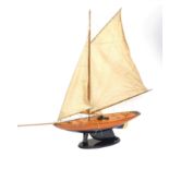 Large wooden model of a rigged sailing boat, 150cm in length x 120cm high : For Further Condition