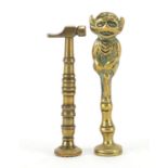 Two Victorian brass pipe tamper's in the form of a goblin and a hammer, the largest 6.5cm high : For