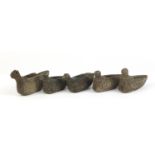 Five Islamic carved stone bird oil burners, the largest 18cm in length : For Further Condition