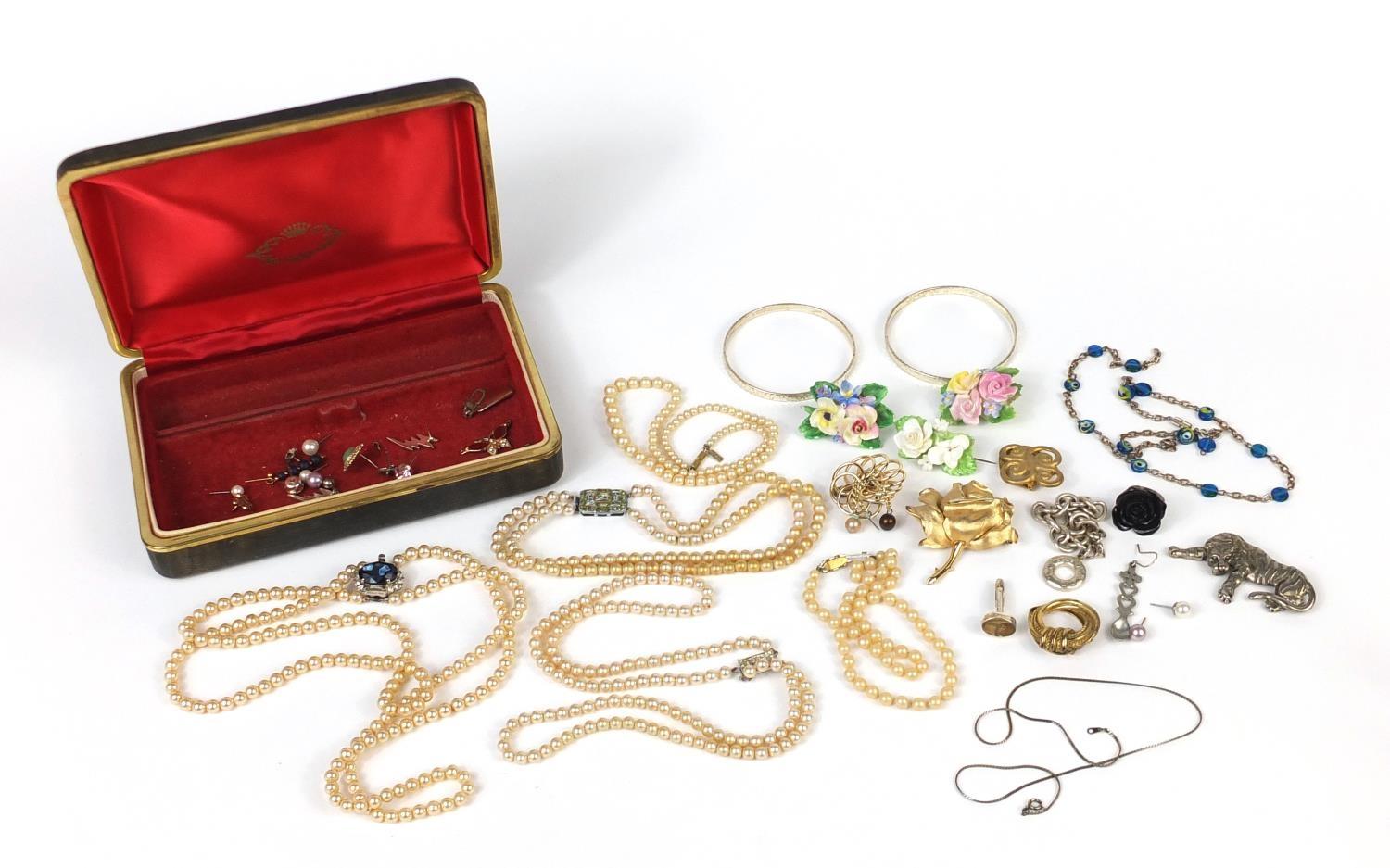 Costume jewellery including brooches, simulated pearl necklaces and earrings : For Further Condition