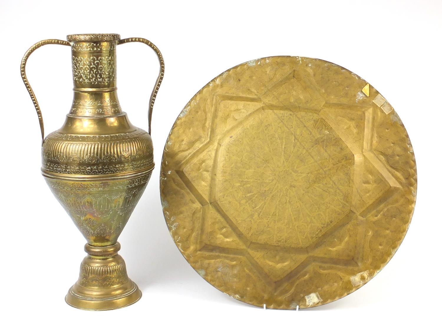 Large Indian brass twin handled vase and circular tray, both embossed and engraved with foliate - Image 4 of 5
