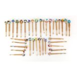 Group of wooden sewing bobbins with glass beads : For Further Condition Reports Please visit our