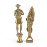 Two Victorian brass pipe tamper's in the form of a gentleman with a pipe and a fish, the largest 7cm