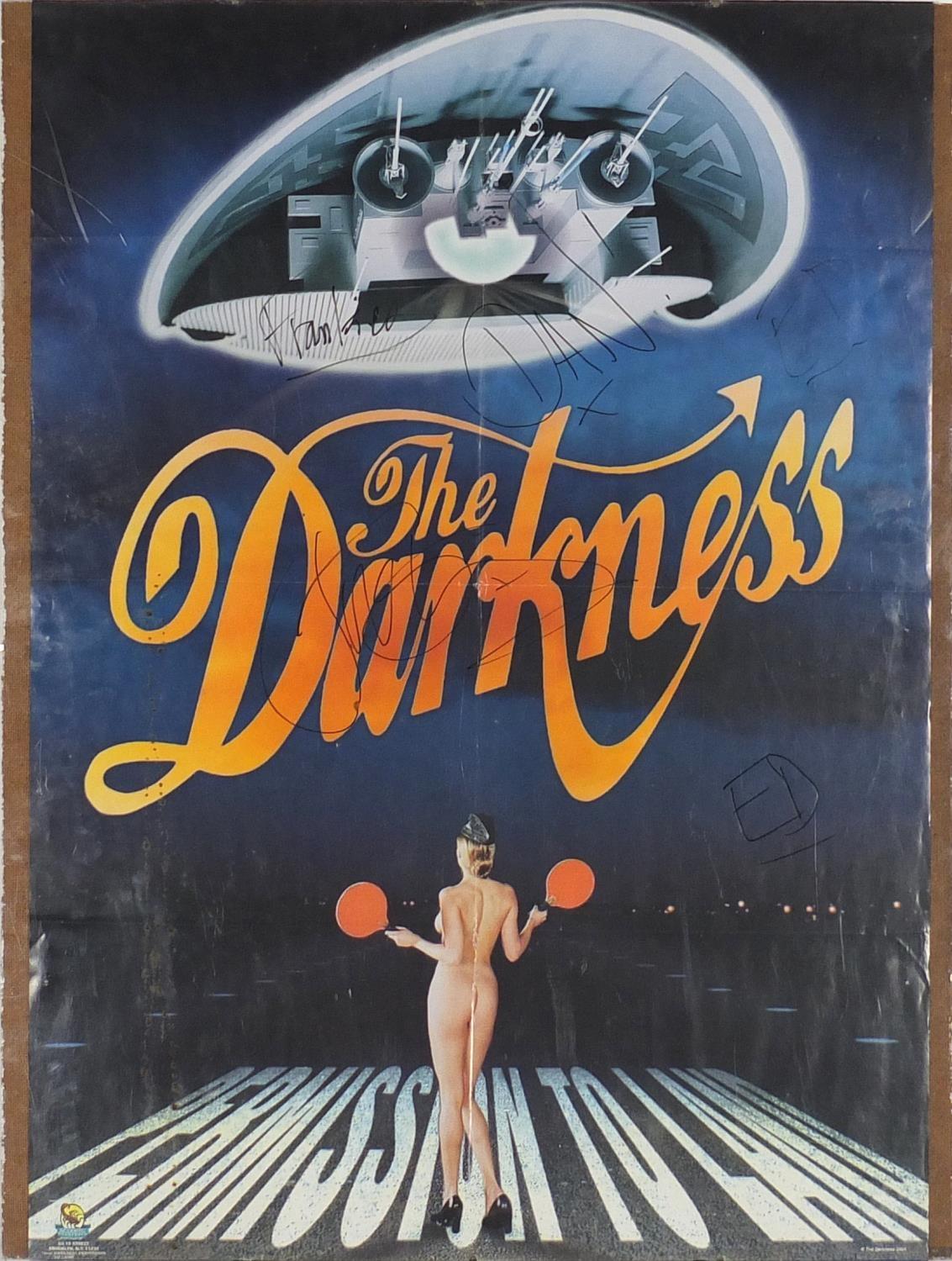 The Darkness poster with five ink signatures, 80cm x 56cm : For Further Condition Reports Please