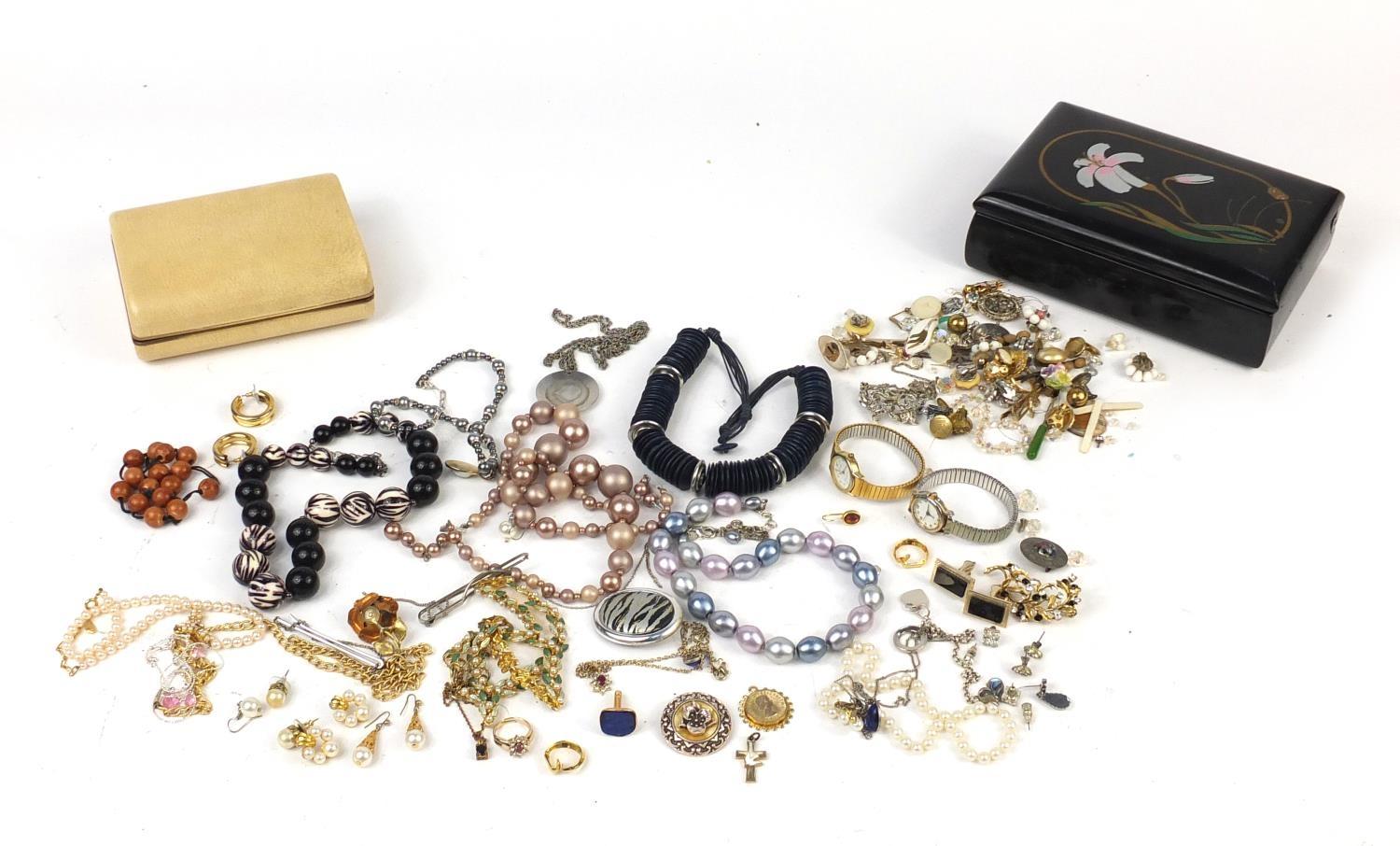 Costume jewellery including brooches, necklaces and earrings, housed in two jewellery boxes : For