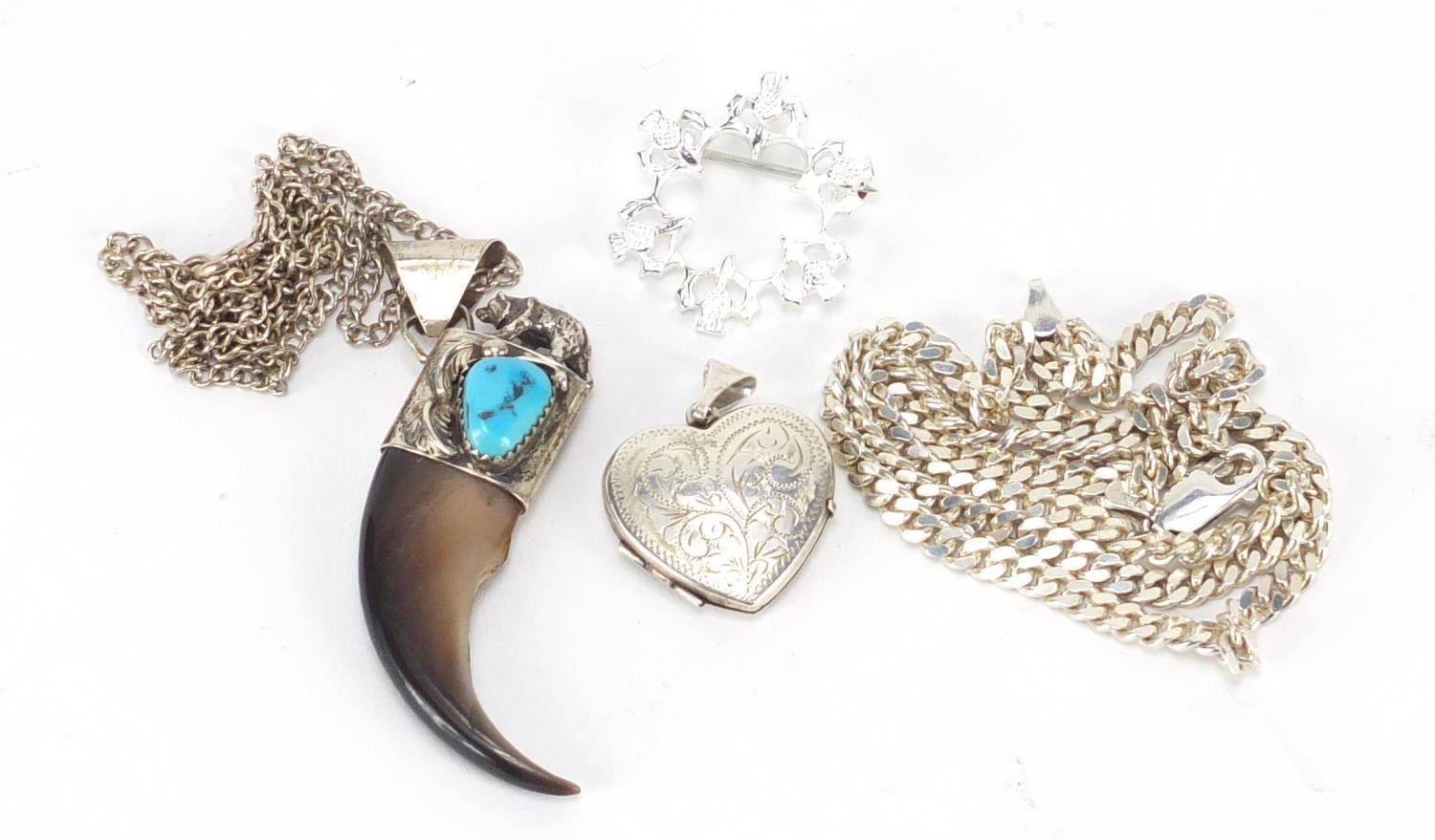 Mostly silver jewellery including a bear claw pendant and love heart locket, 43.0g : For Further