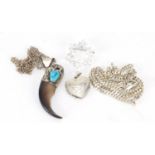 Mostly silver jewellery including a bear claw pendant and love heart locket, 43.0g : For Further