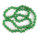 Chinese green jadeite bead necklace, 80cm in length : For Further Condition Reports Please visit our