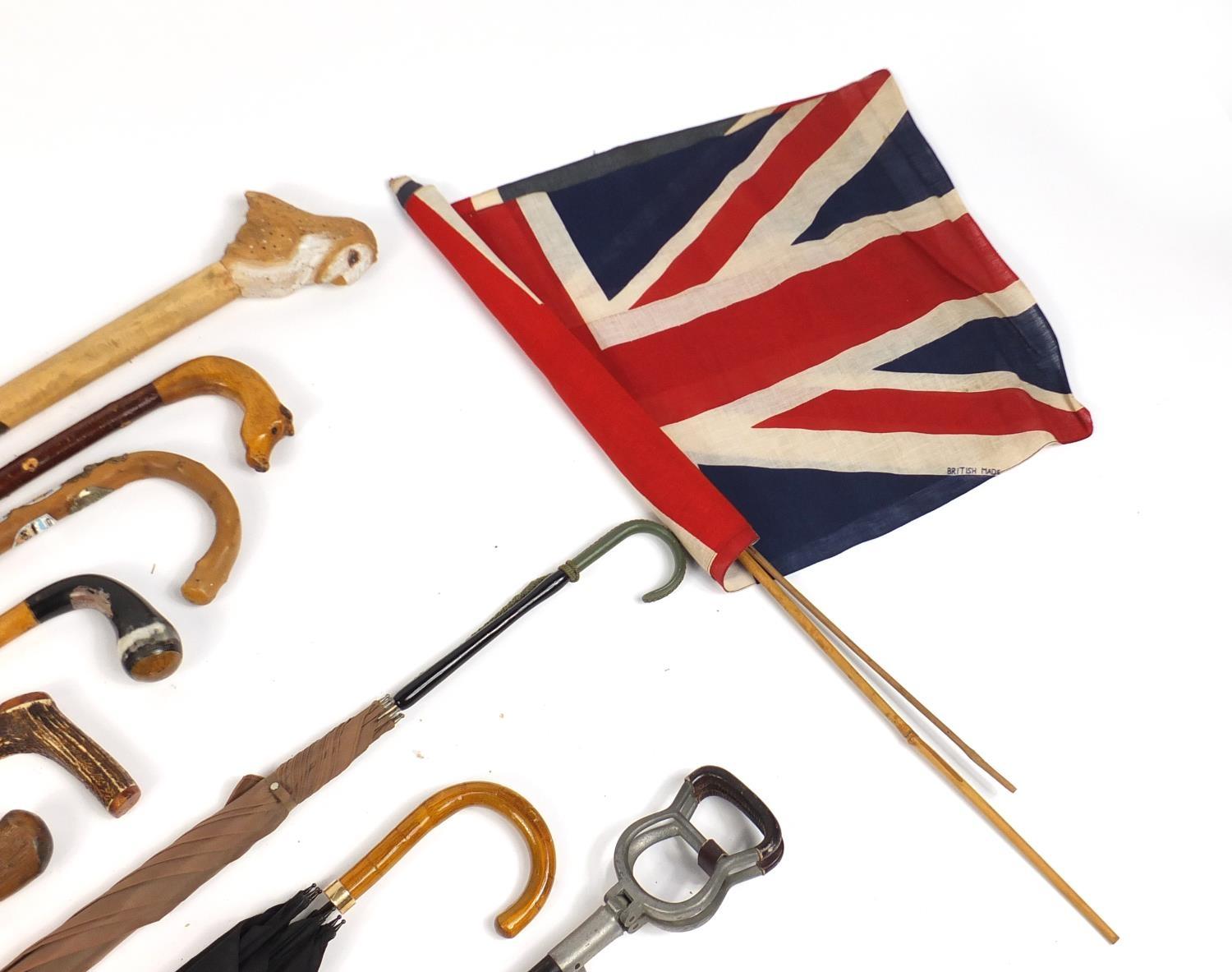 Vintage and later walking sticks, parasols and a Union Jack flag, some with silver handles : For - Image 5 of 6