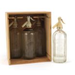 Four vintage advertising soda siphons including Schweppes : For Further Condition Reports Please
