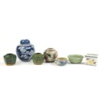 Oriental ceramics including a blue and white ginger jar and cover, hand painted with prunus