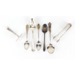 Silver and white metal spoons, sugar tongs and food pusher, various hallmarks, the largest 16cm in